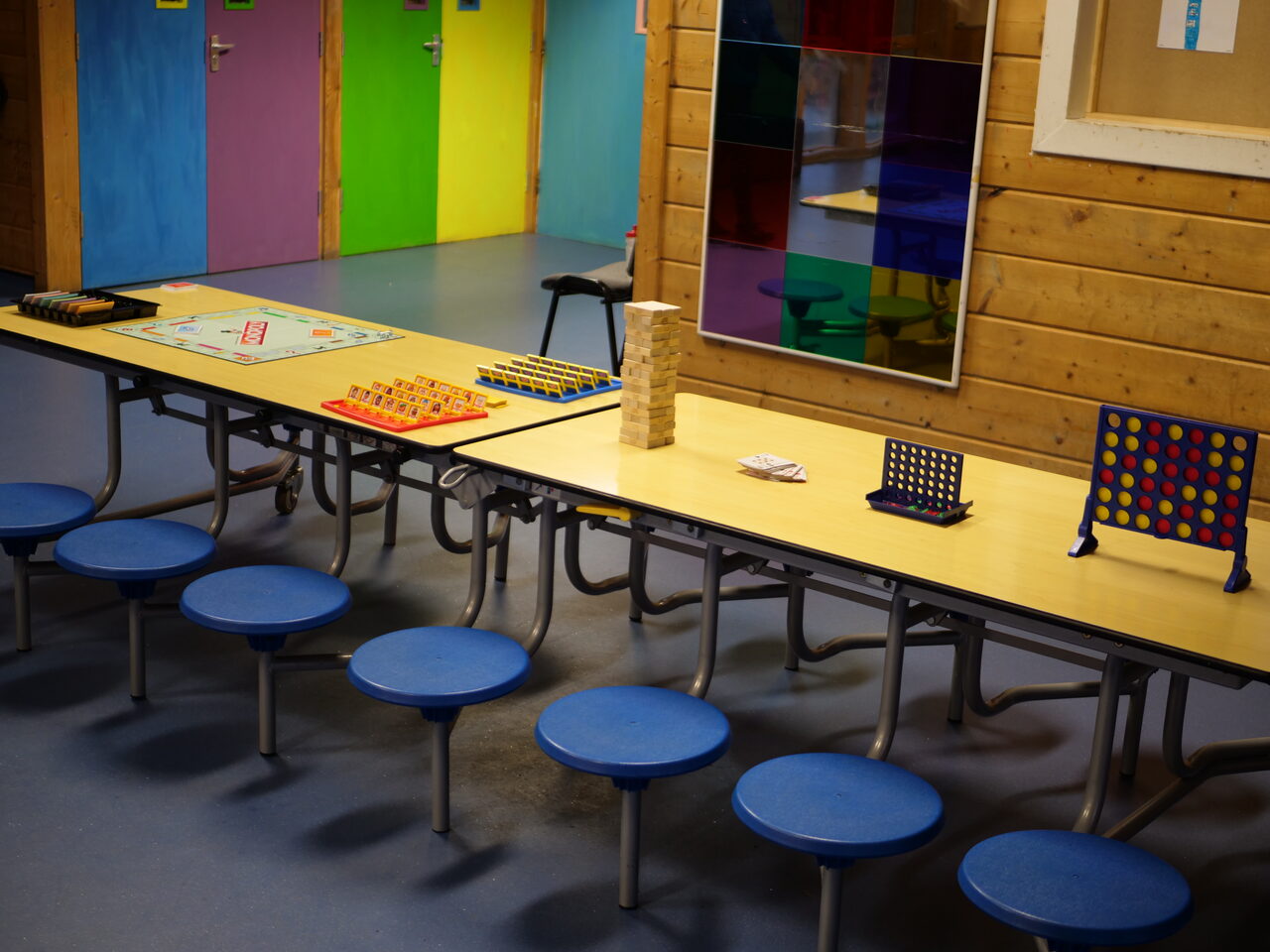 A bright activity room at our provision with games and space to work