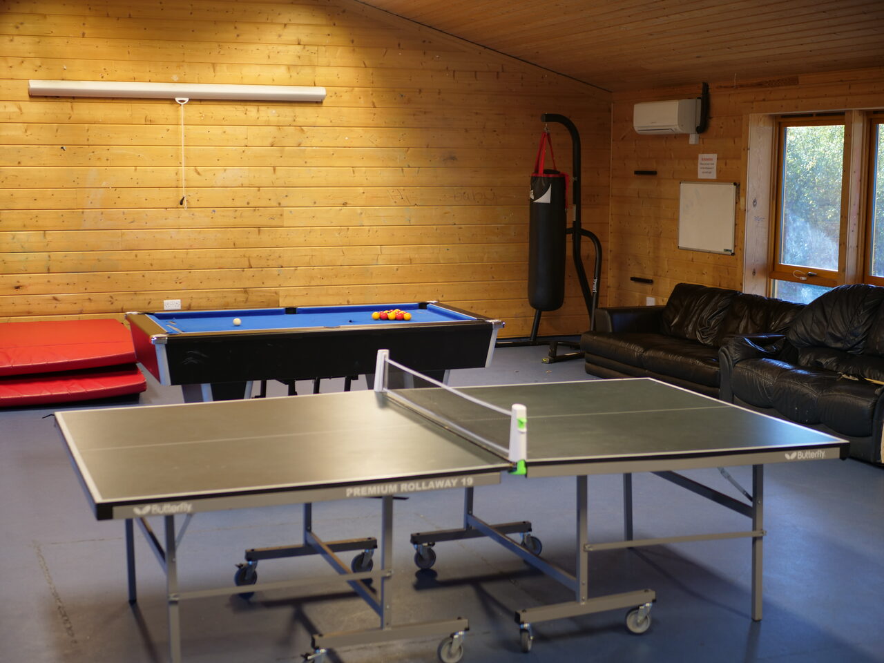 The games room at our provision, with a pool table and table tennis
